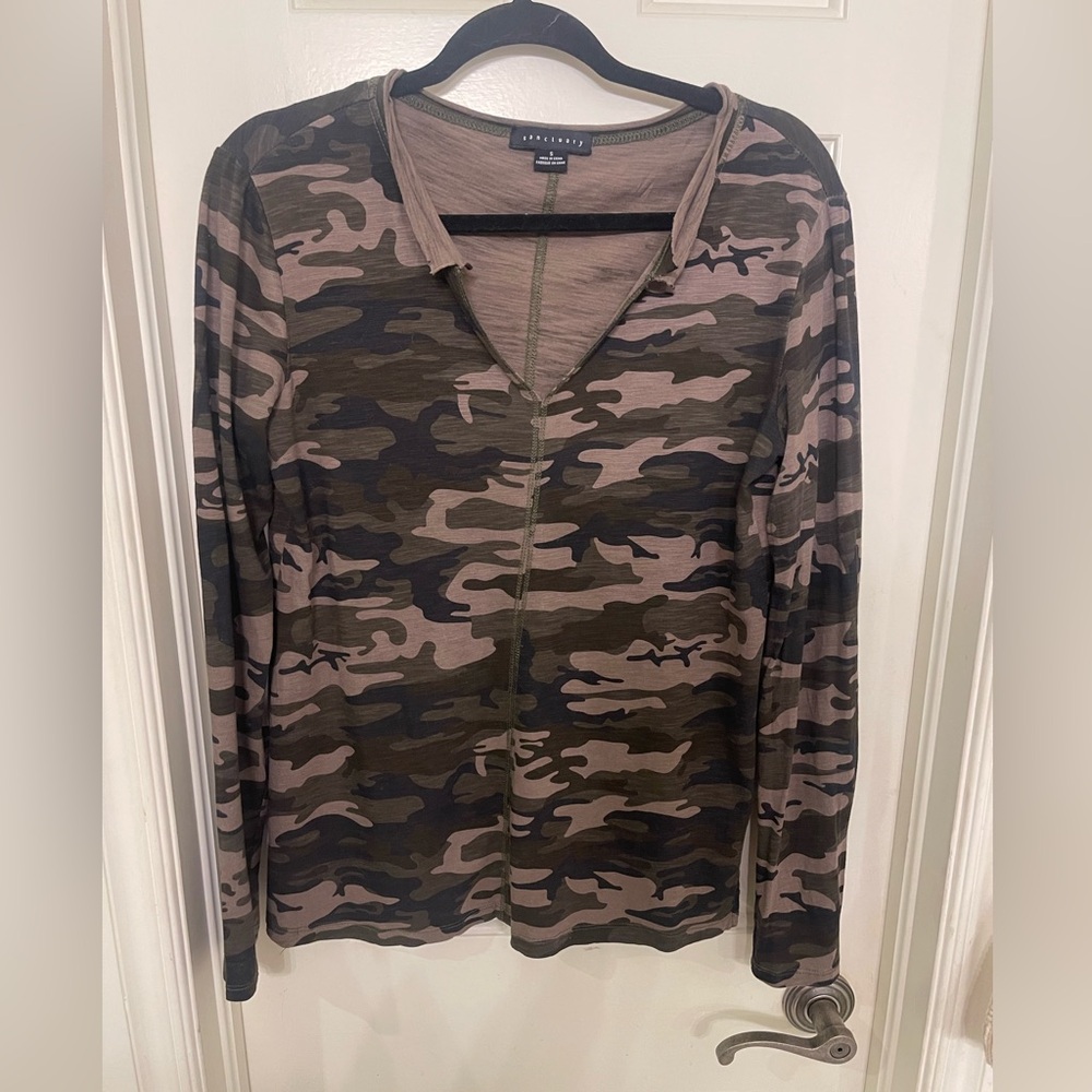 Anthropologie’s oversized Sanctuary camouflage long sleeve t-shirt